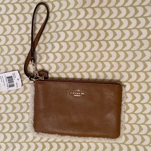 New Coach wrist purse with shearling detailing